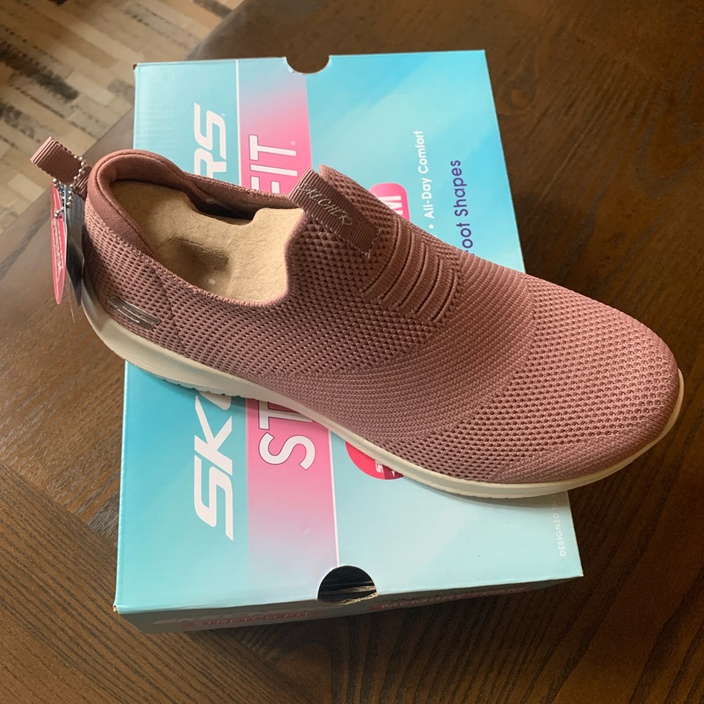 Women’s mauve Sketchers first take shoes